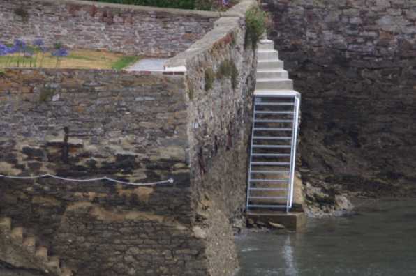 26 July 2022 - 10-00-32
Two tides a day, plus a fair whack of stormy weather does take its toll on the seawalls in the river. The modern long term solution is metal. And no wonder.
--------------
Dart riverside steps in Kingswear